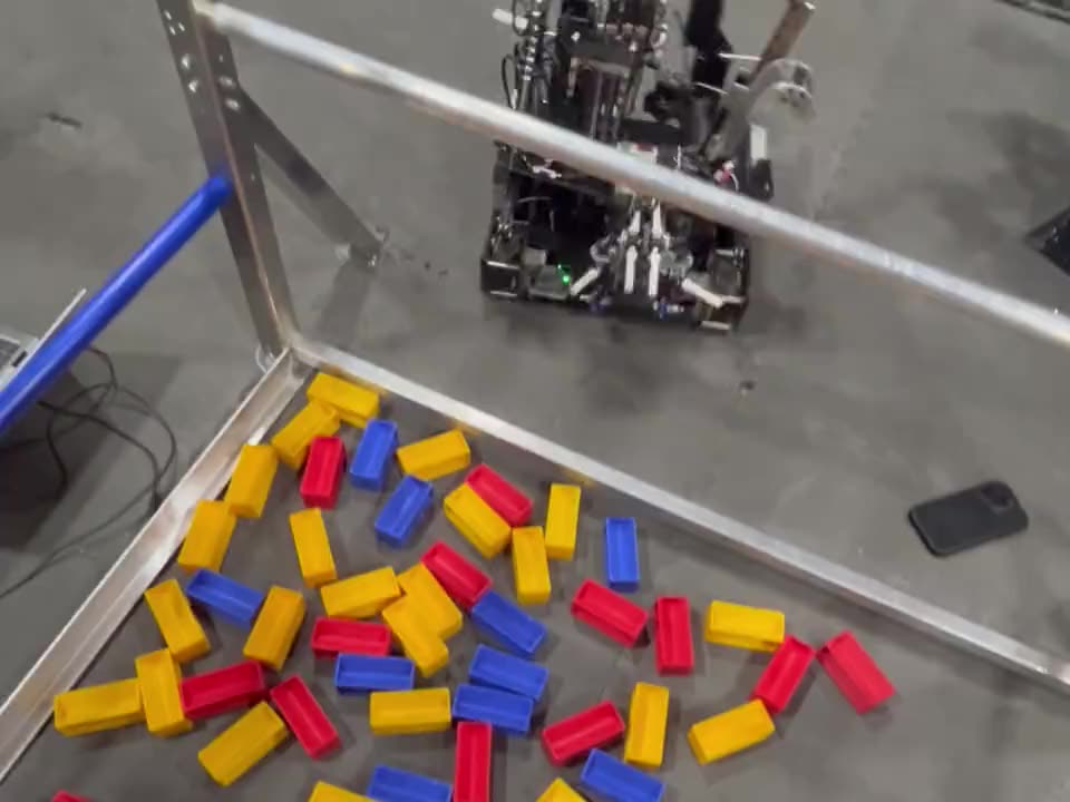 The 22312 robot lining up over the sample field and collecting blocks under Limelight vision.